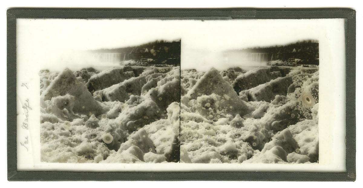 Man Standing on Ice Bridge