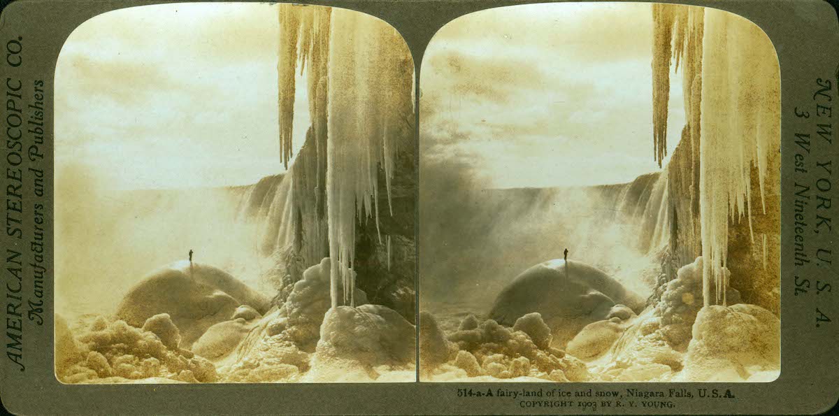 Man Standing on Ice Under Niagara Falls
